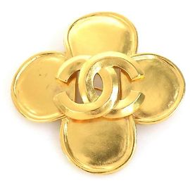 Broche de metal dourado Chanel Coco Mark