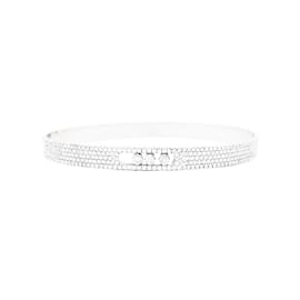 Bracciale Messika, "Bangle Pavé Move Noa", oro bianco e diamanti.