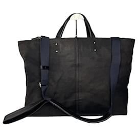 Borsa da viaggio vintage in denim / pelle Yves Saint Laurent nera e marrone