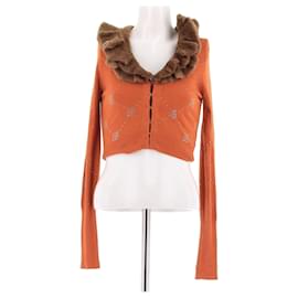 Top corto naranja Blumarine con cuello de piel sintética