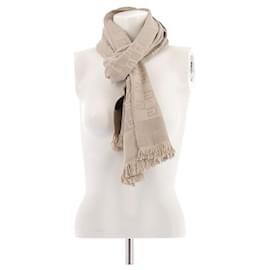 Sciarpa in seta beige con monogramma Gucci