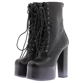 Stivaletti con tacco in pelle - Saint Laurent
