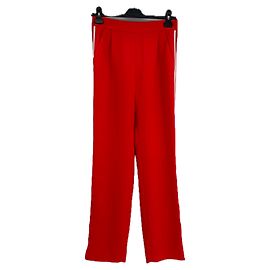 Pantalones rojos Claudie Pierlot con rayas blancas
