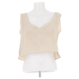 Top corto sin mangas beige Totême