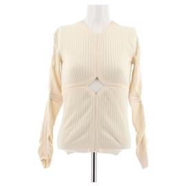 Top Courreges in lana beige a maniche lunghe
