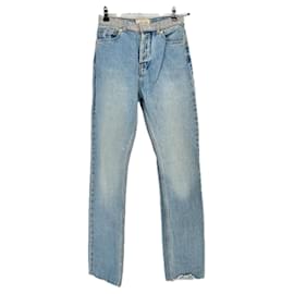 Jeans azules Alexandre Vauthier con cinturón de strass