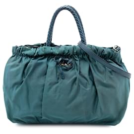 Borsa a mano in tessuto blu con fiocco Prada