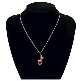 Collana con motivo a cuore Coco Mark in oro e strass rossi di CHANEL
