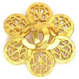 Broche de metal dourado Chanel Coco Mark