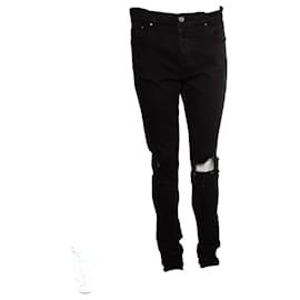 Amiri, Jeans desgastados en negro