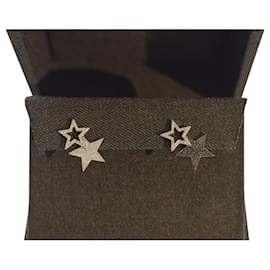 Autre Marque Orecchini asimmetrici in diamante a stella e diamante nero di Nikos Koulis – Con scatola