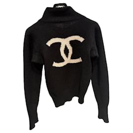 Maglione Chanel in cashmere nero e bianco con CC