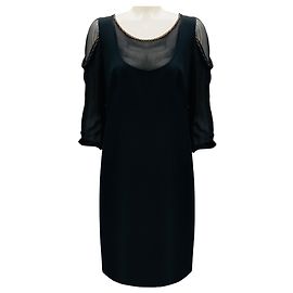 Abito da cocktail in chiffon di seta e crepe nero con dettagli in catena dorata Moschino