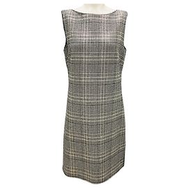 Abito senza maniche in lana e cashmere a quadri houndstooth beige / nero di Prada
