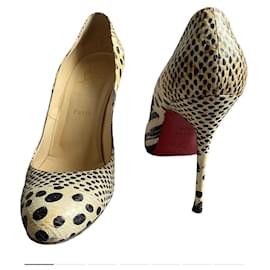 Décolleté Christian Louboutin in pelle motivo pitone nero