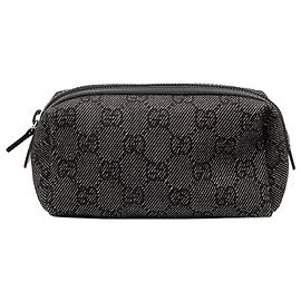 Pochette cosmetica in denim GG grigio di Gucci