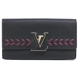 Portafoglio bi-fold Capucines in Taurillon Louis Vuitton