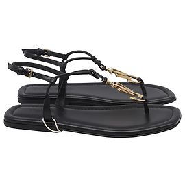 Flache Sandalen mit Knöchelriemen und Jw Anderson Anker-Logo aus schwarzem Leder