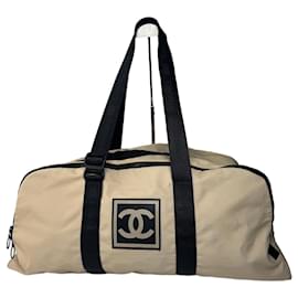 Borsa da viaggio sportiva vintage Chanel nera e bianca