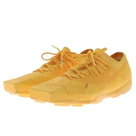 Sneakers Coperni in tessuto gialle