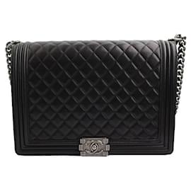Borsa a spalla vintage in agnello nero con finiture argentate per uomo - Chanel