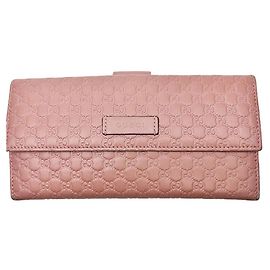 Gucci Portafoglio lungo in pelle con patta micro continentale Sima Signature