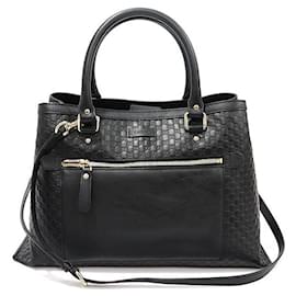 Borsa tote in pelle micro Guccissima nera con finiture dorate