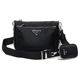 Borsa a tracolla in Re-Nylon con logo triangolare in tessuto Saffiano nero - Prada
