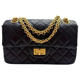Chanel Mini-Handtasche aus Vintage-Kalbsleder mit goldfarbenem Metall in Schwarz