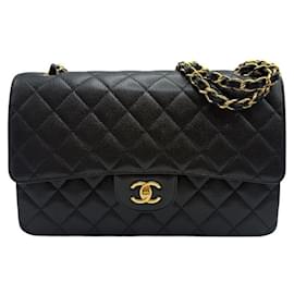 Chanel Borsa flap classica grande in caviale con chip integrato nera