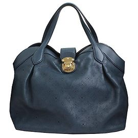 Louis Vuitton Bolso Tote Tilblue en tono dorado Mahina