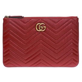Gucci Clutch GG Marmont in tono oro