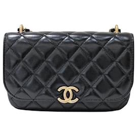 Chanel Mini borsa con patta e catena