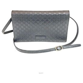 Gucci Micro GG Clutch Crossbody