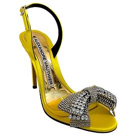 Sandali con tacco in satin giallo Alexandre Vauthier con fiocco decorato con cristalli