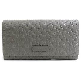 Cartera larga de cuero Micro Guccissima de Gucci