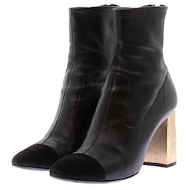 Botines de ante negro con tacones dorados - Chanel