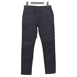 Saint Laurent Pantalones de mezclilla negros ajustados para hombre