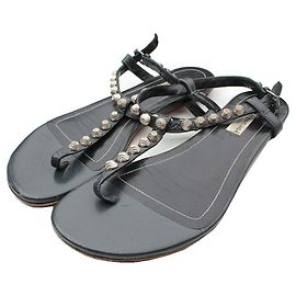 Balenciaga Sandali T-Strap Rockstud in pelle grigio carbone