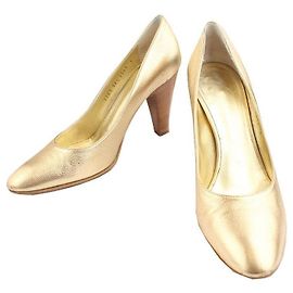 Giuseppe Zanotti Décolleté in metallo oro