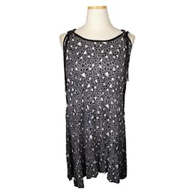 Abito asimmetrico con glitter nero e bianco a forma di cuore - Balmain