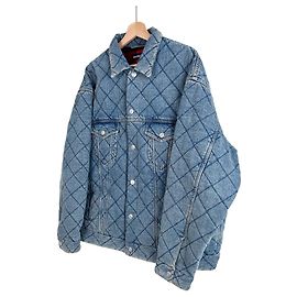 Balenciaga Übergroße gesteppte Denim-Truckerjacke