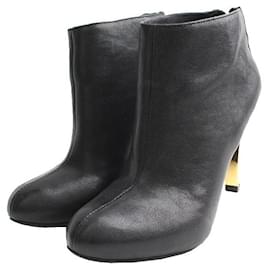 Botines de tacón dorados - Tory Burch