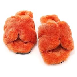Sandali Oran in shearling arancione per donne - Hermès