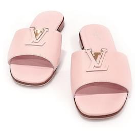 Louis Vuitton Mule piatte in pelle di vitello rosa LV Mare per donne