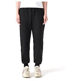 Alexander Mcqueen Pantalones de chándal con logo de graffiti negros