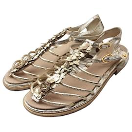 Chanel Sandali piatti in pelle oro champagne Camelia