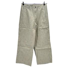 Jeans ancho beige con estampados - Puma