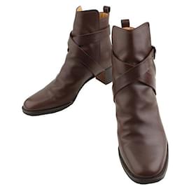 Hermès Botines de cuero marrón chocolate con detalles en tono plateado