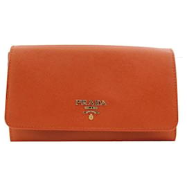 Cartera de mano en Saffiano Papaya con asa en tono dorado - Prada